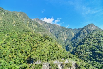 Fototapeta na wymiar Beautiful Scenery of Green Mountains Near Qingshui Cliff in Taroko National Park
