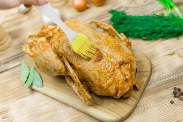 Raw duck in spices and sauce.