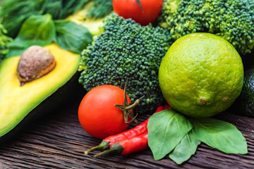 Fresh vegetables, lime and avocado close