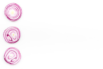 Ring of fresh red onion on white background top view space for text