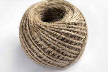 the texture of the twine strands in a tangle on a white background