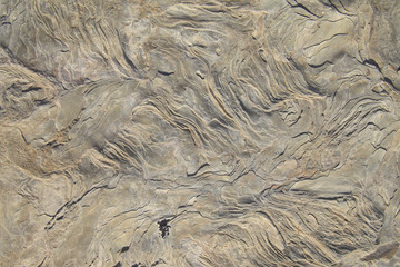 Close up of intricate texture of rock formation as background.