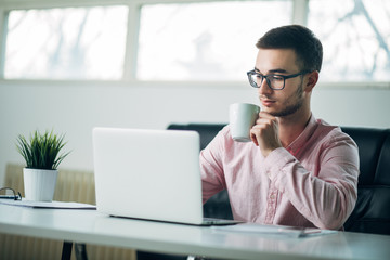 Young man in office