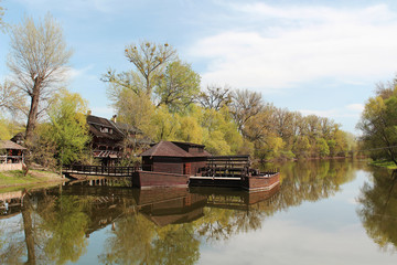 Obraz premium Landscape with floating boat mill, now technical museum, Slovakia