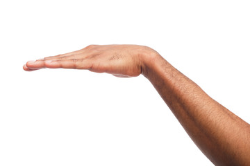 Black man holding palm down isolated on white