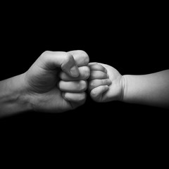 fist bump - father and son