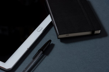 Tablet, notebook and pen