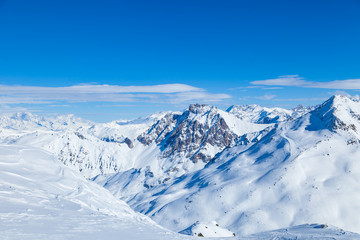 Fototapeta na wymiar Alpine winter landscape of slopes and off piste skiing, in the highest French resort of Val Thorens, Les Trois Vallees