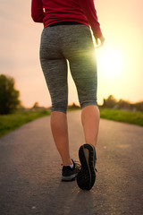 Young woman resting after jogging