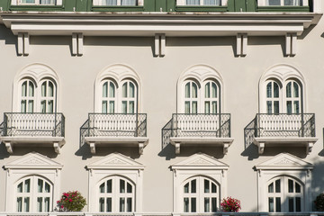 windows and balcony on beautiful facade 