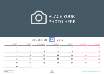 Wall calendar for December 2019. Vector design print template with place for photo. Week starts on Monday. Landscape orientation