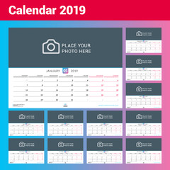 Wall monthly calendar for 2019 year. Vector design print template with place for photo. Week starts on Monday. Landscape orientation. Set of 12 pages