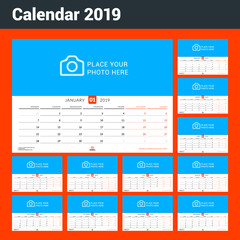 Wall monthly calendar for 2019 year. Vector design print template with place for photo. Week starts on Monday. Landscape orientation. Set of 12 pages