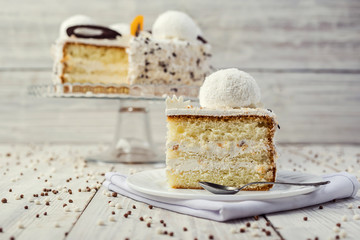 biscuit with cream, decorated by marshmallow and chocolate