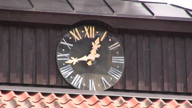 Close up of clock on town hall of Tosa, Sweden.