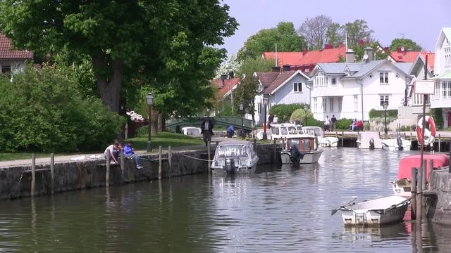 River in Trosa with boats and houses, Sweden.