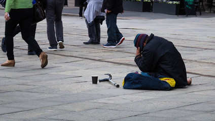 Homelss man on street in Norway
