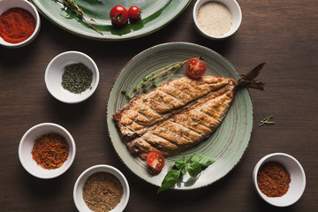 White fish juicy fillet grilled on barbecue