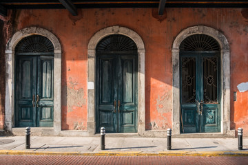 old wooden doors historic building facade 