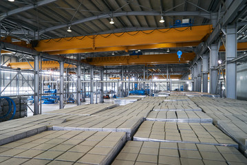 Large warehouse hangar of factory interior. Industry manufacturing concept