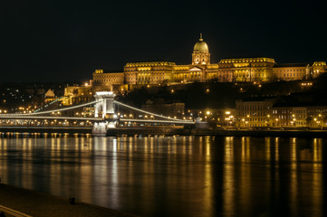 Fototapeta na wymiar Chain Bridge with the Royal Palace in the background in Budapest at night