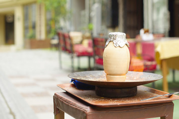 cooking in a pot on the street. traditional Turkish dish