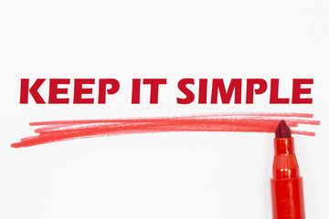 KEEP IT SIMPLE word written with red marker