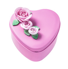 Pink heart-shaped gift box isolated on white