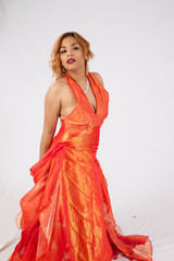 Lovely land in long orange dress