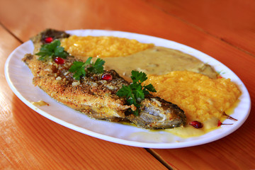 Trout fried with banusz and mushroom soup. Tasty dish