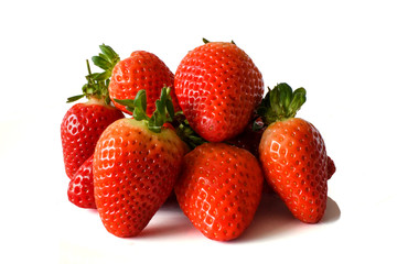 Strawberries against a plain white background