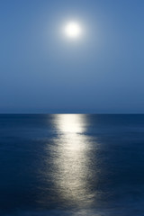 moon reflection on the sea in the night