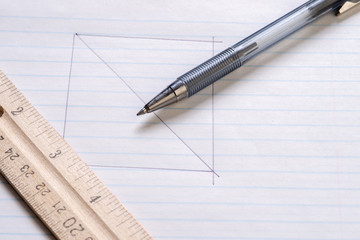 Pen ruler and paper