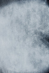 Blue rough and grainy paper texture or background.  To be used as a design element in different projects.