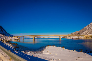 Beautiful outdoor view of Gimsoystraumen Bridge is a cantilever road that crosses the strait between the islands of Austvagoya and Gimsoya