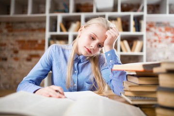 Teenage girl in a library