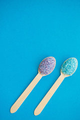 Spa. Sea Salt Grind On Wooden Light Blue Shabby Table Wooden Spoon. Kitchen And Cosmetic Healthy Usage.