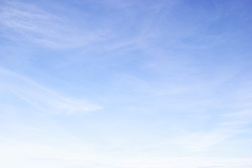 Blue sky background and white clouds soft focus, and empty space