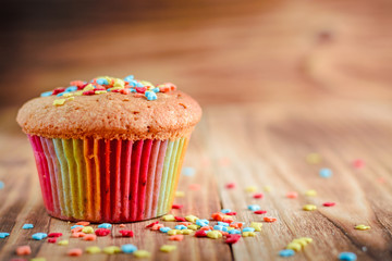 festive fruitcake on wooden background