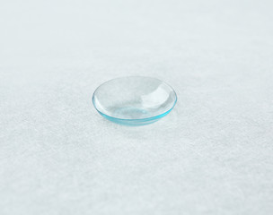 Contact lens on light background