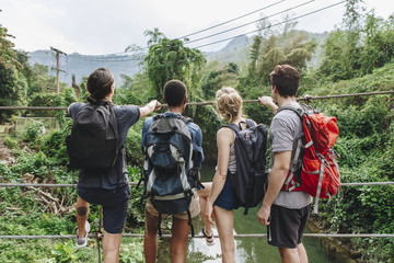 Group of young adult friends outdoors recreational leisure, freedom and adventure concept