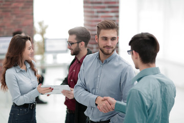 Group of business people who standing and discuss.