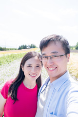 Obraz premium couple with landscape in Furano
