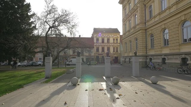 Bust statues in front of the University of Maribor
