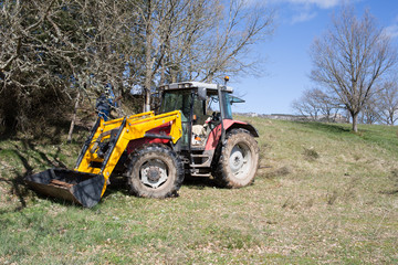 A tractor used in the field of tillage