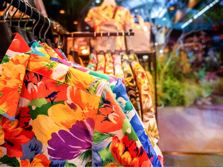 Aloha shirt hanging on rack in fashion retail store