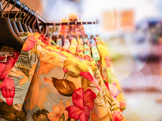 Aloha shirt hanging on rack in fashion retail store