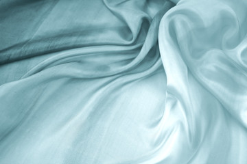 Obraz premium The texture of the satin fabric of bluecolor for the background 