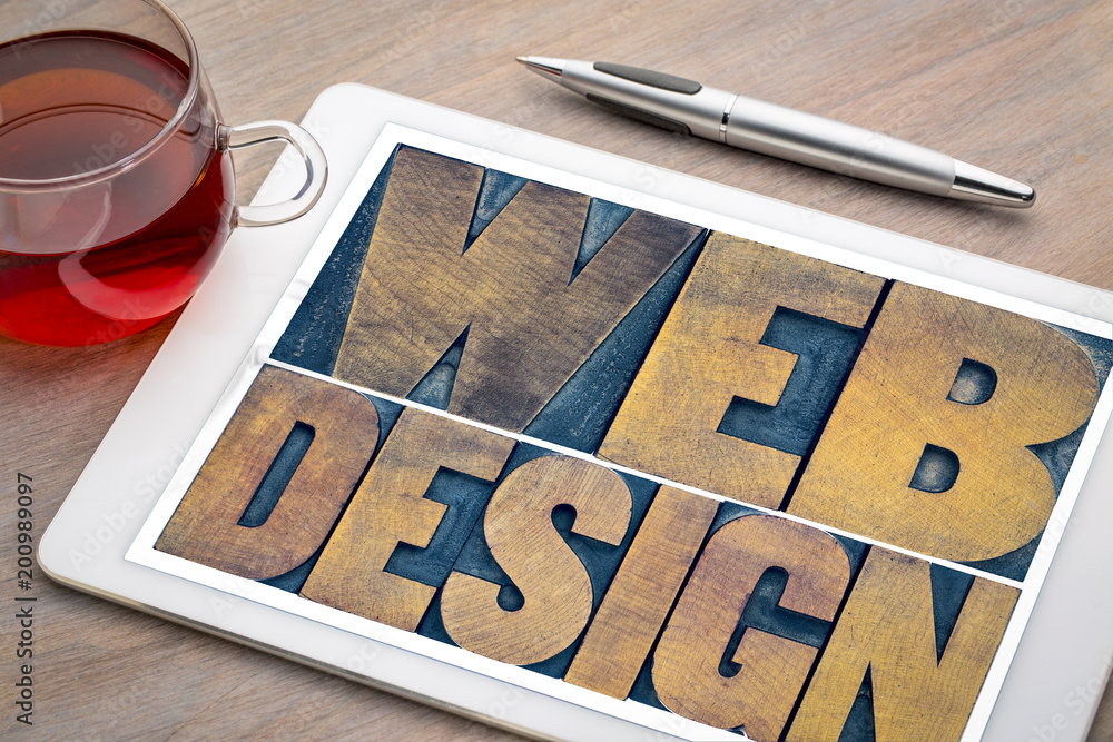Wall mural web design word abstract on a digital tablet