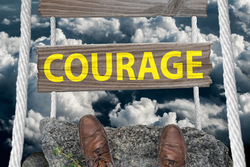 Challenging bridge with text Courage